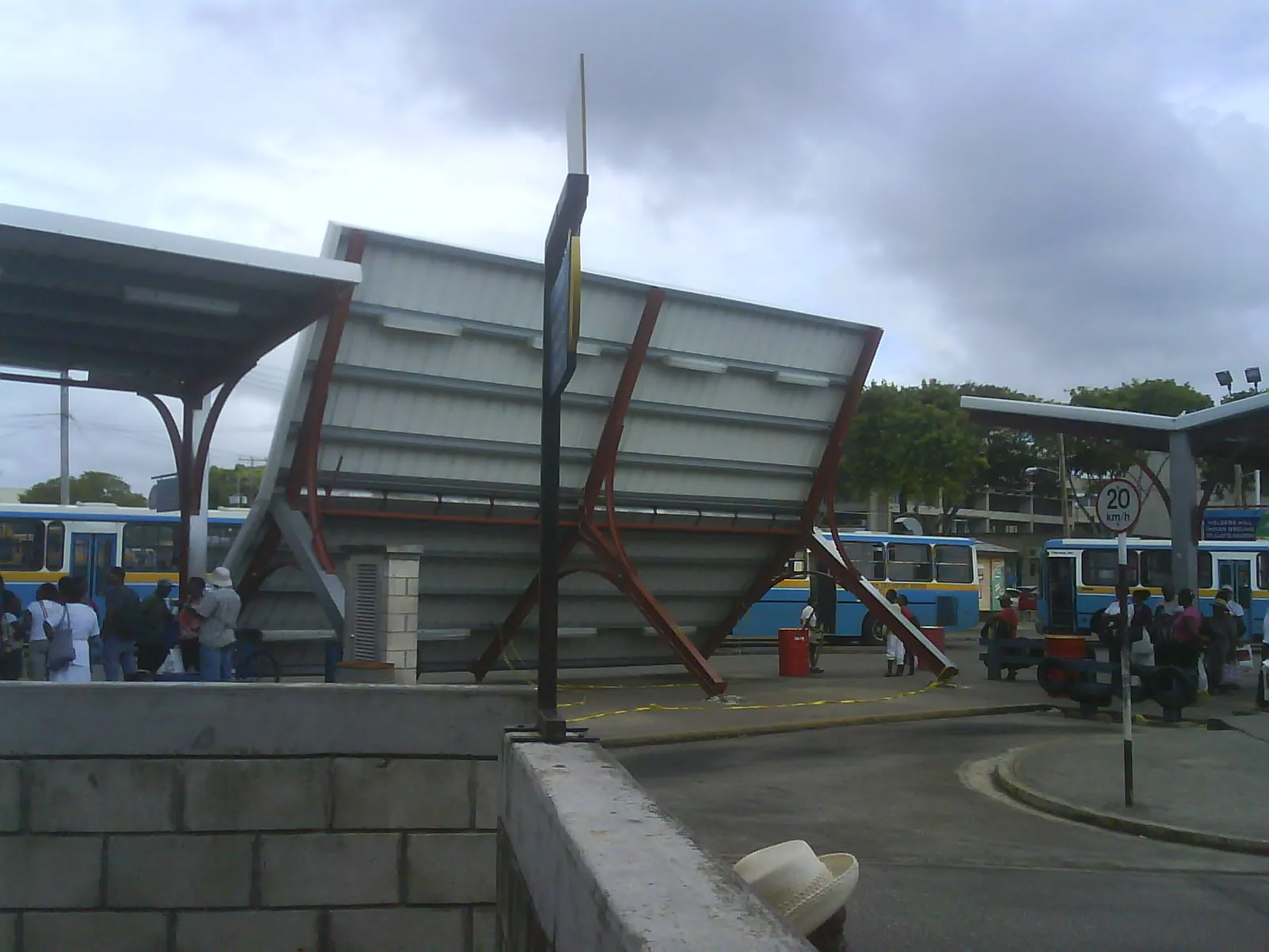 Storm-damaged berths and torn roof structure at the Princess Alice Bus Terminal in Bridgetown, Barbados, after Tropical Storm Tomas