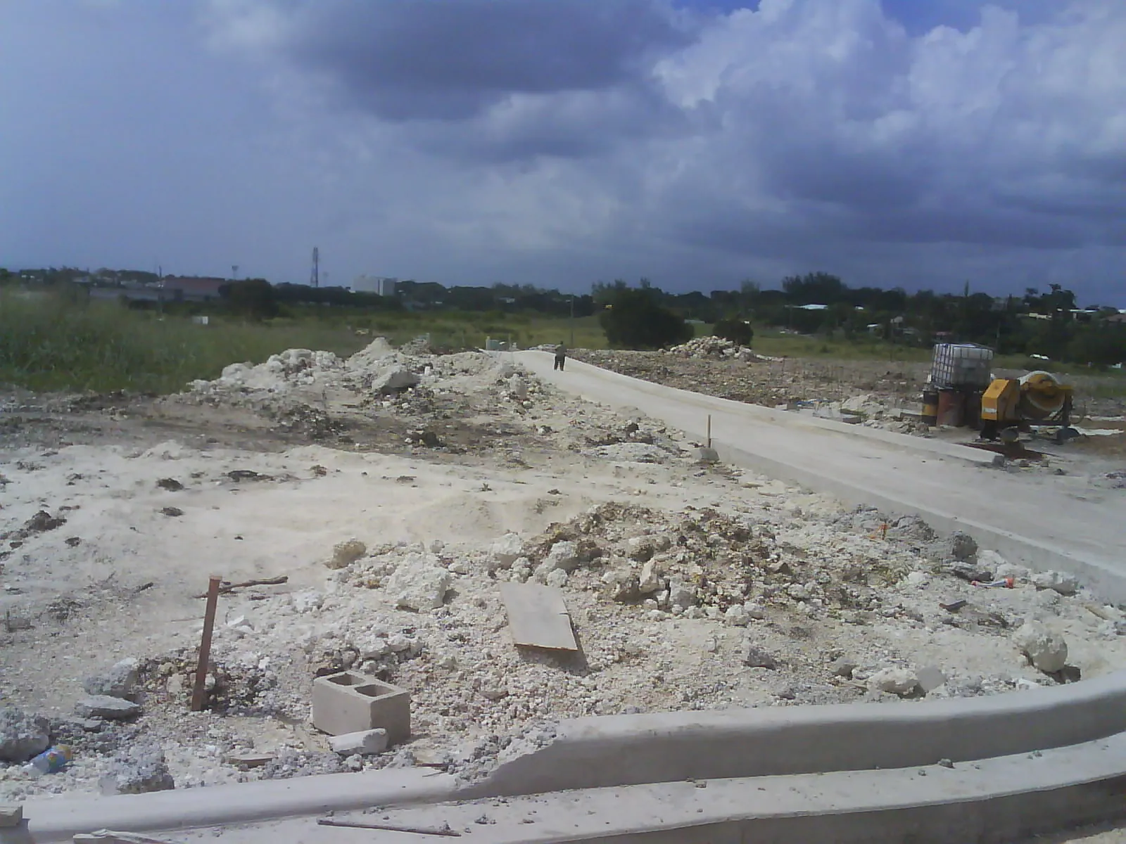 A new access road cut through open land for the South View housing development in Christ Church, Barbados