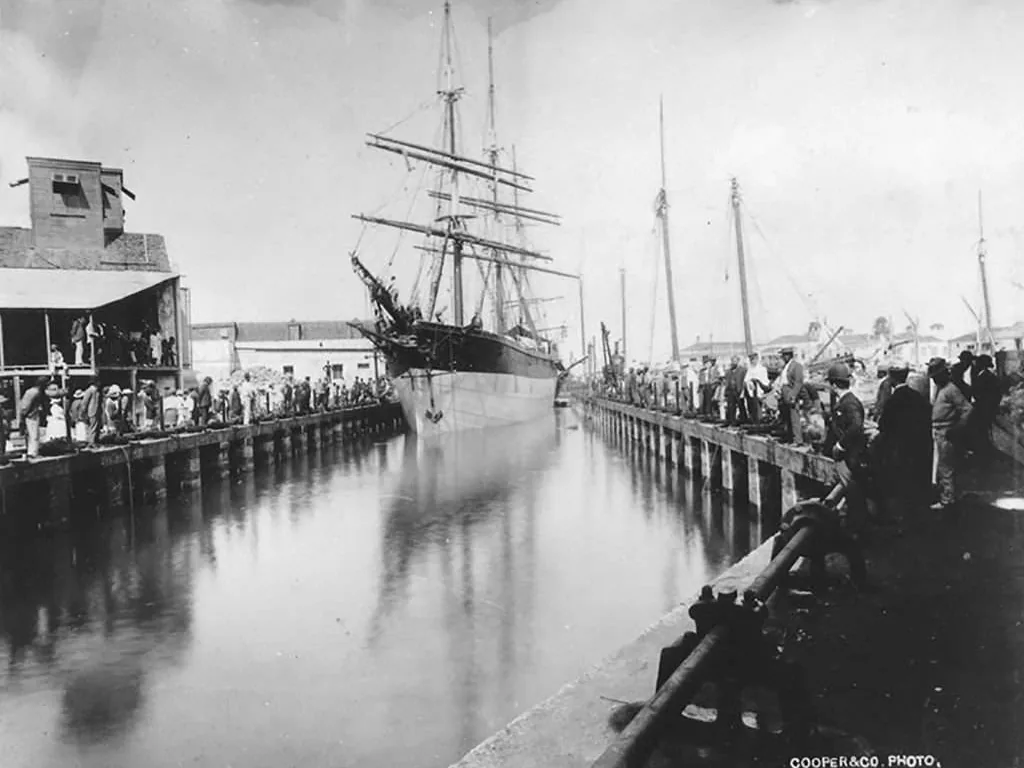 Historic black-and-white photograph of a sailing ship in the Blackwood Screw Dock, Bridgetown