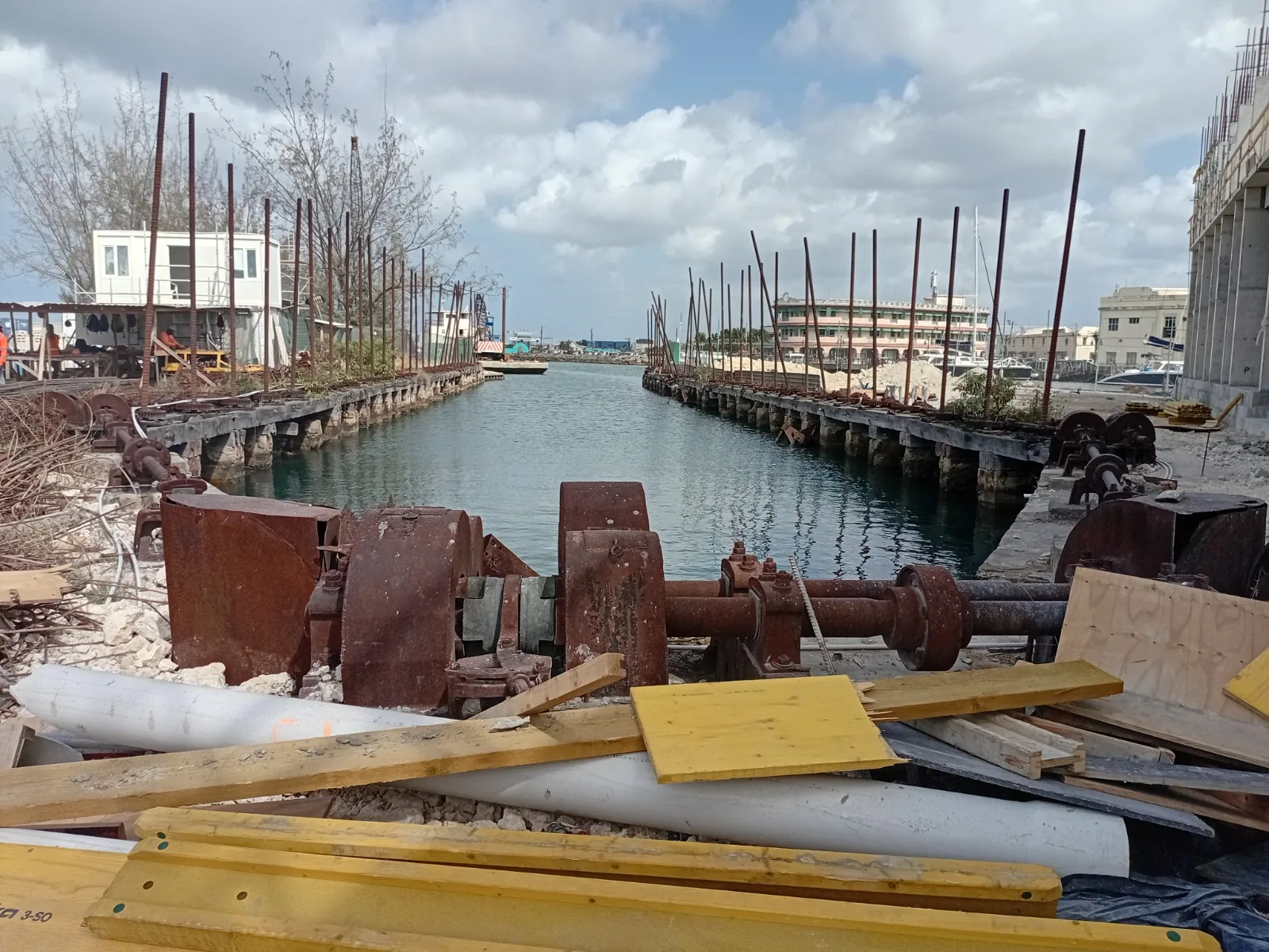 Current photograph of the Blackwood Screw Dock under restoration with construction materials on the quay