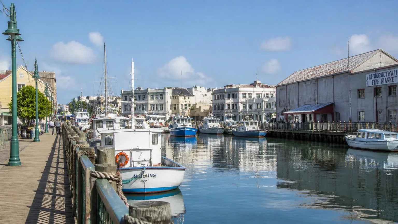 Boats moored along the Careenage waterfront in Bridgetown, Barbados