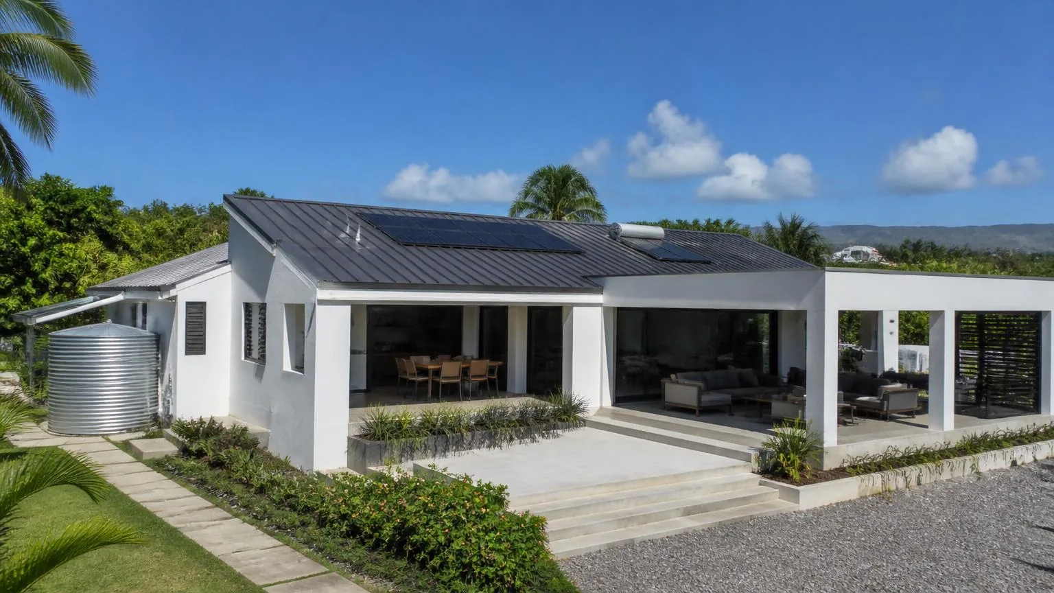 Contemporary Barbadian house with rooftop photovoltaic panels